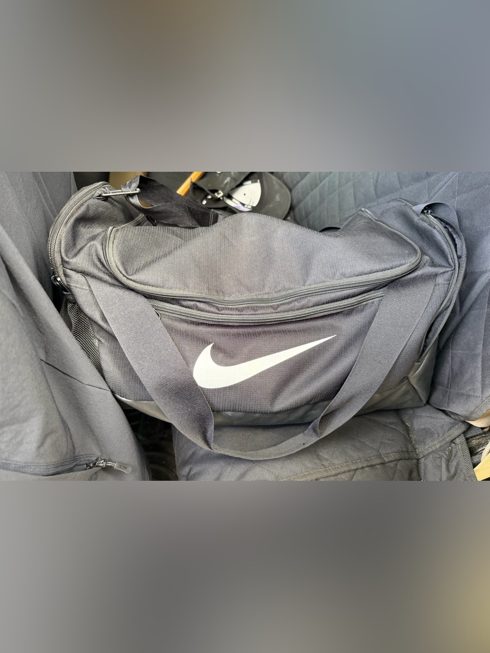 Nike Black Duffel Bag with White Swoosh Logo